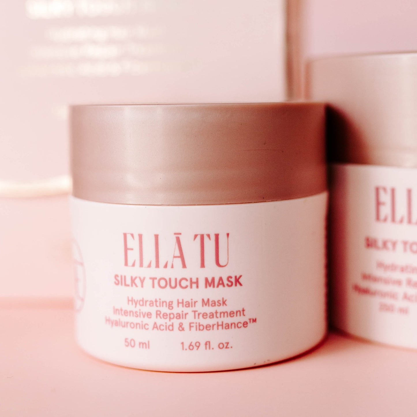 The travel size hair mask by Ellatu. Take your routine with you, where ever you go. Enriched with our deeply hydrating, nourishing formula with Fiberhance, Hyaluronic Acid, Moringa Oil, Castor Oil and Gold Vitamin E capsules, for deep conditioning, moisturizing and bond building.